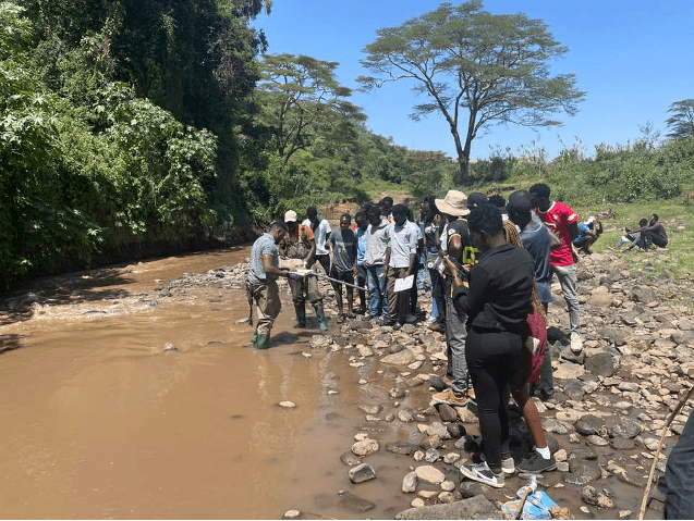 Freshwater bioindicators training at Enkare Narok River.